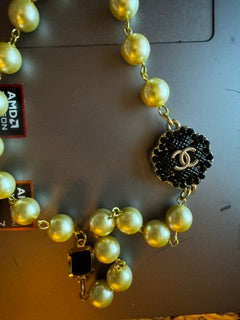 EKD - Pearl Necklace with Black Chanel Logos