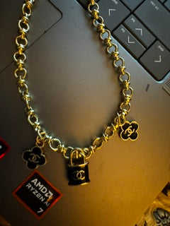 EKD - Gold chain with small Chanel charms