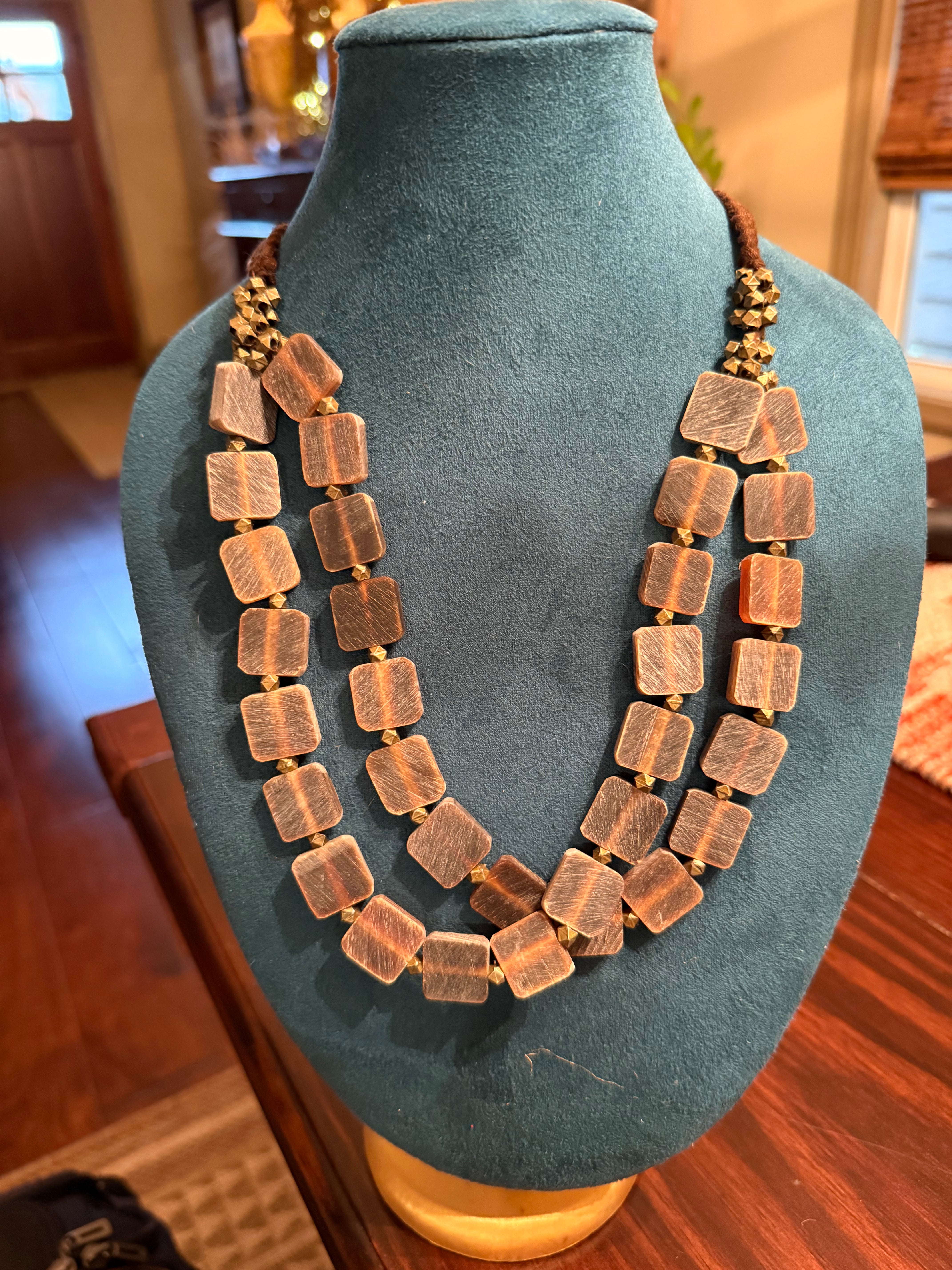 Multi Strand Tribal Necklace with Square Beads and Gold Metal Accents on a Brown Braided Cord
