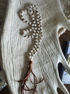 Long Pearl Necklace on Knotted leather with tassel