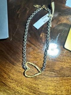silver chain with a gold heart CV Designs