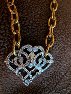 Gold Necklace with Silver Decorative Heart