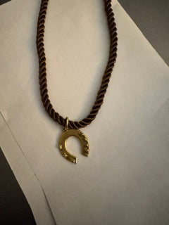 Rope necklace with horseshoe