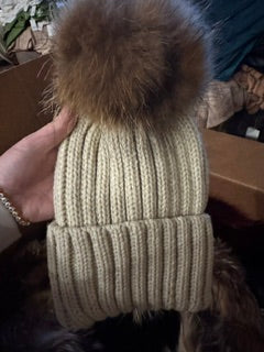 Beige knit hat with pom pom
