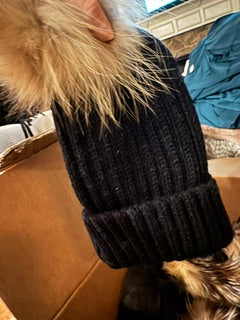 Black knit hat with pom pom