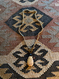 Carved Bone Pendant Necklace with Amber Glass Beads on a Brass Chain