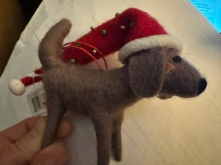 Brown wool dog w/long red santa hat ornament