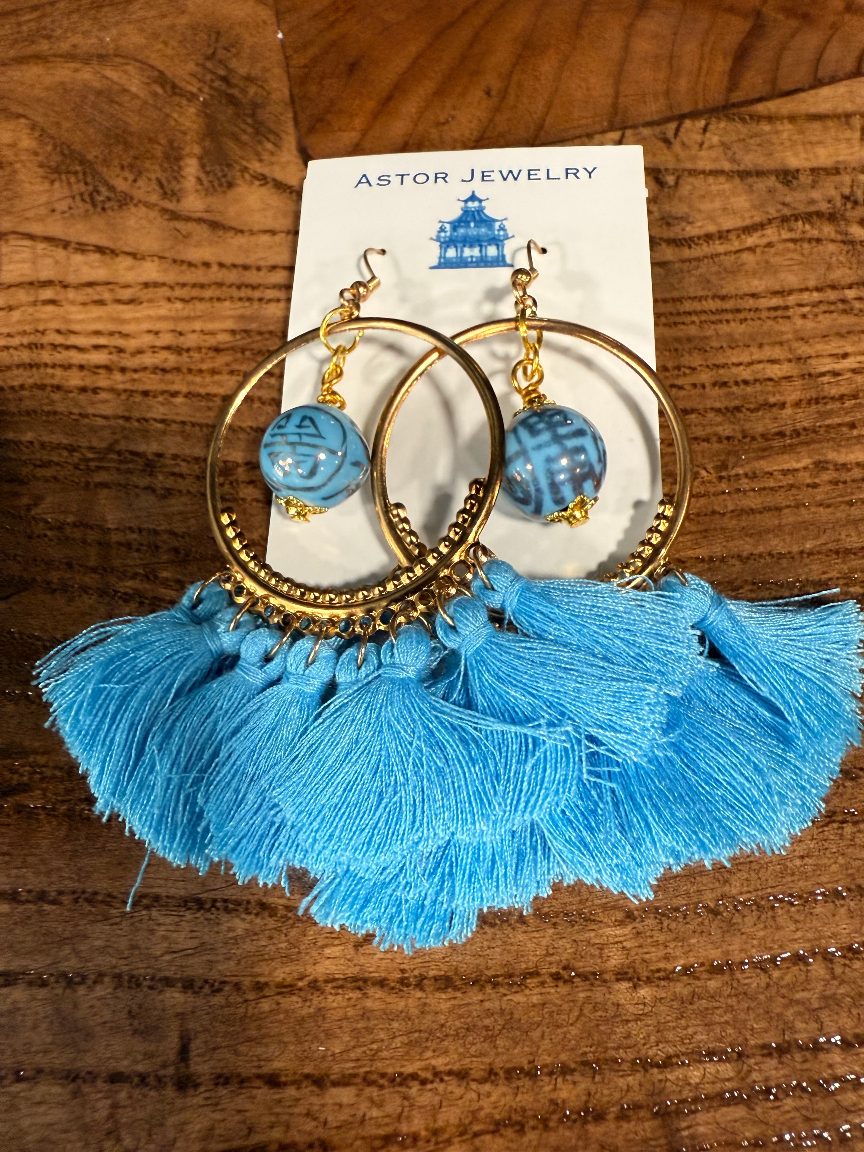 Gold Toned Hoop Earrings with Blue Ceramic Beads and Tassels