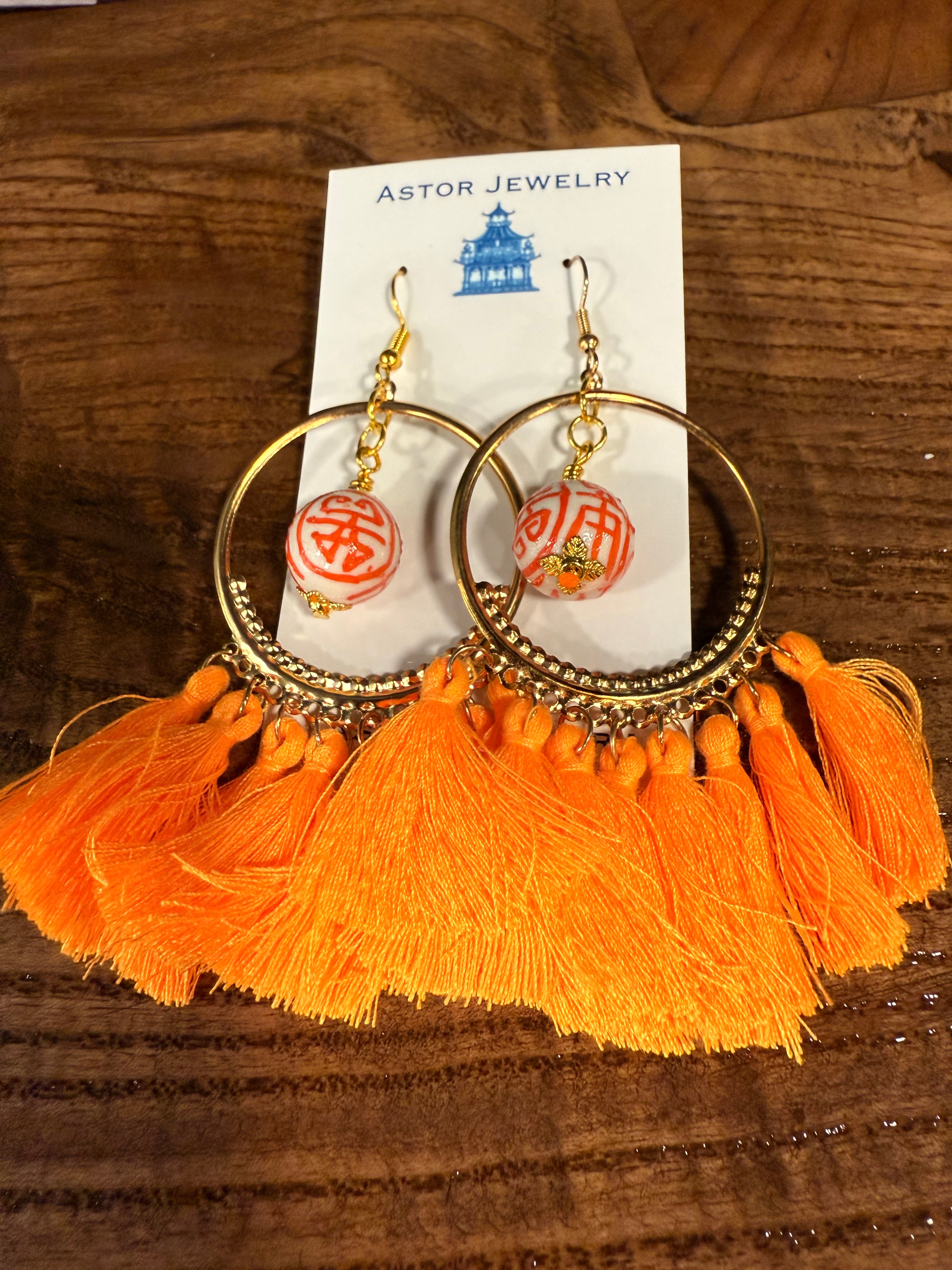 Gold Hoop Earrings with Orange Porcelain Beads and Tassels