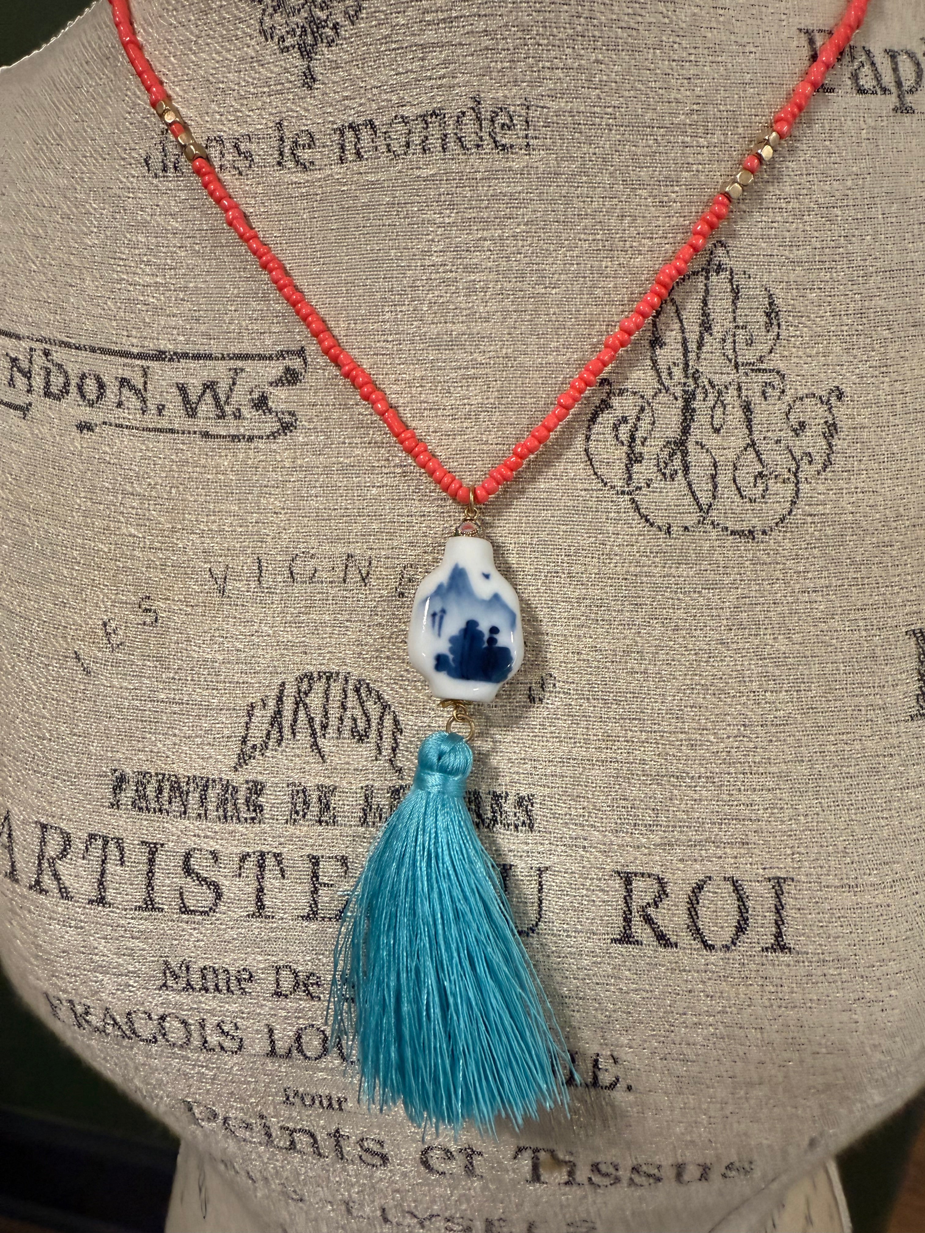 Coral Beaded Necklace with Porcelain Pendant and Silk Tassel