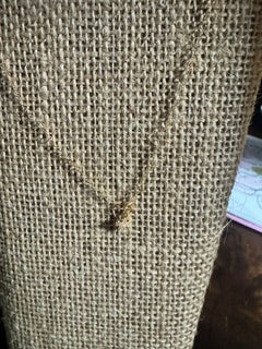 Gold delicate chain with small diamond cross