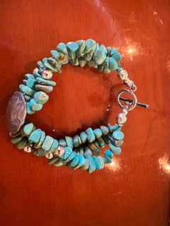 Paige Wallace Turq SS multi stranded Nickel bracelet