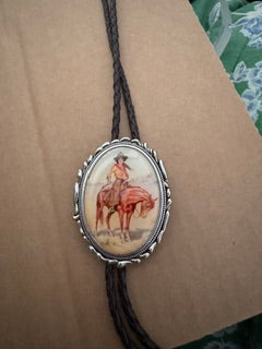Brown Rope Bolo with Cowgirl on a horse pendant