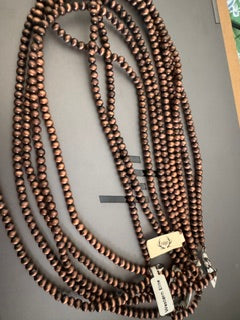 Copper inspired medium length pearls